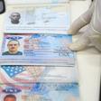 A handout picture released by the Venezuelan Presidency shows on May 4, 2020, passports of US citizens arrested by security forces in relation to a failed maritime 'invasion'