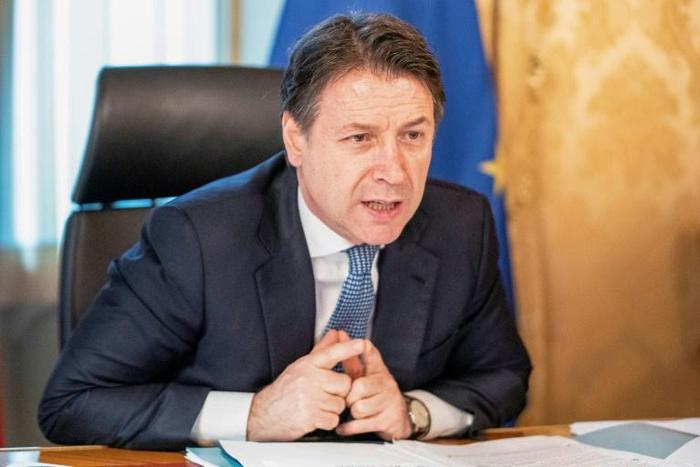 This handout photo shows Italian Prime Minister Giuseppe Conte, who wants a "strong and sufficient" financial response that deploys "innovative financial instruments truly adapted to a war"