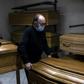 Giampiero Palmero, owner of a funeral home in Revello, laments having to seal coffins quickly before family can bid farewell to loved ones, as the coronavirus alters funeral traditions in Italy
