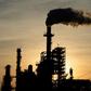 The sun sets behind smoke rising from the LyondellBasell-Houston Refining plant in Houston, Texas, as US crude futures fell below zero for the first time