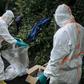 Two staff members of the Congolese Ministry of Health pack their equipment after performing a COVID-19 test at a private residence in Goma, northeastern Democratic Republic of Congo, on March 31, 2020