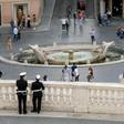 Police keep watch near the Spanish Steps at Piazza di Spagna, in Rome, as the city takes cautious steps to end the virus lockdown