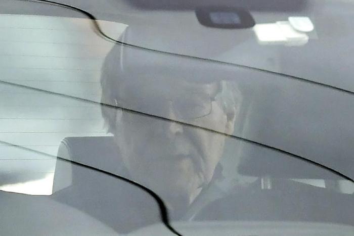 Cardinal George Pell is driven from prison after being released