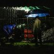 Gravediggers conduct an "express burial" at night in Managua, Nicaragua, a procedure that has become more common since the beginning of the COVID-19 pandemic