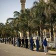 Worshippers wearing facemasks attended Friday prayers at Johannesburg's Nizamiye Mosque after the government said religious services could resume from June 1