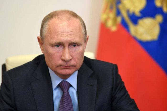 The Kremlin this week began easing a national lockdown to slow the spread of the virus, despite the steady rise in infections; President Vladimir Putin is pictured in Novo-Ogaryovo outside Moscow