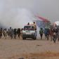 Aid workers fear the virus could prove devastating if it spreads inside the crowded camps holding hundreds of thousands of displaced people