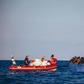 A picture released by German migrant rescue NGO Sea-Eye shows an operation to rescue people in distress off the Libyan coast in April