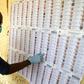 Face masks and gloves are new to election workers preparing polling stations for Mali's vote