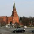 The patriarch's van with tinted windows was escorted by other vehicles with flashing emergency beacons