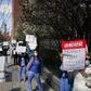 Members of the medical staff listen as Montefiore Medical Center nurses call for N95 masks and other ‘critical’ PPE to handle the coronavirus (COVID-19) pandemic on April 1, 2020 in New York