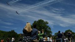 The US Navy Blue Angels and US Air Force Thunderbirds fly over Washington, DC