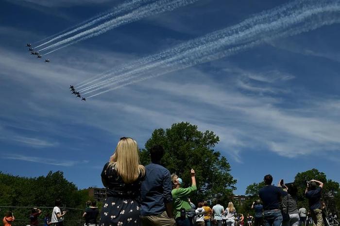 The US Navy Blue Angels and US Air Force Thunderbirds fly over Washington, DC