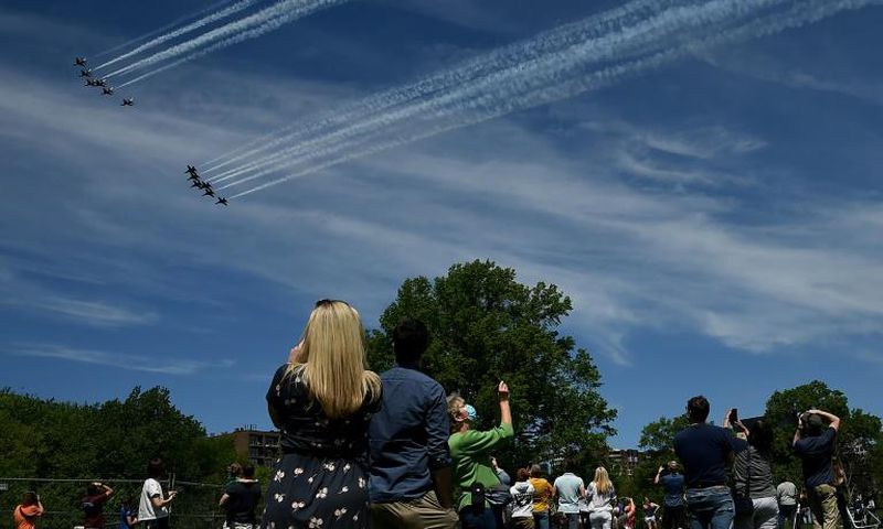 The US Navy Blue Angels and US Air Force Thunderbirds fly over Washington, DC
