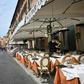 Many of Rome's outdoor restaurants and cafes were either closed Friday night or had free tables overseen by forlorn staff with little to do but chat