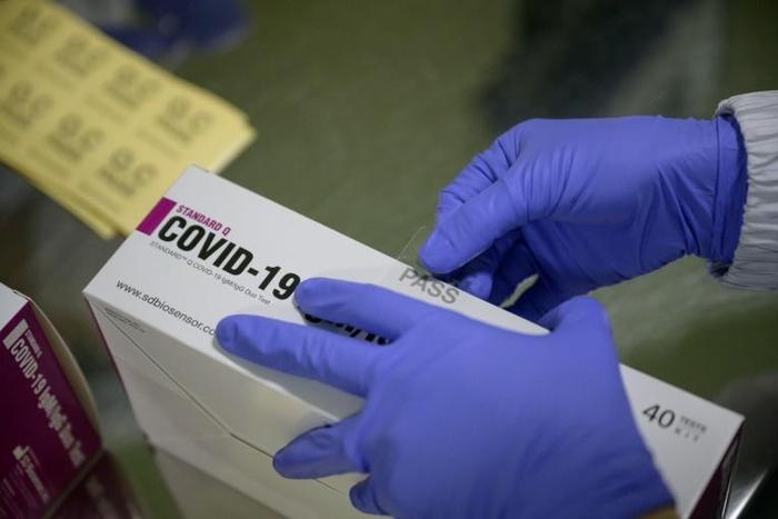The South Korean factory makes 350,000 coronavirus test kits a day and plans to up that to a more than a million when it starts working around the clock next month