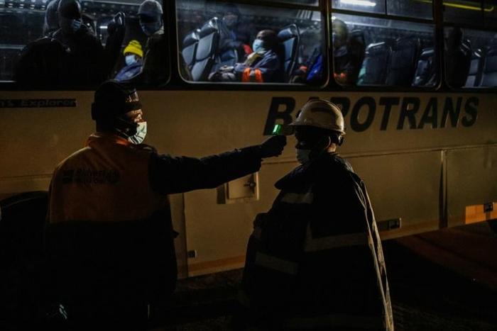 Each shift at the Sibanye-Stillwater platinum mine in South Africa now begins with a temperature check, part of screening measures to stem the spread of the novel coronavirus