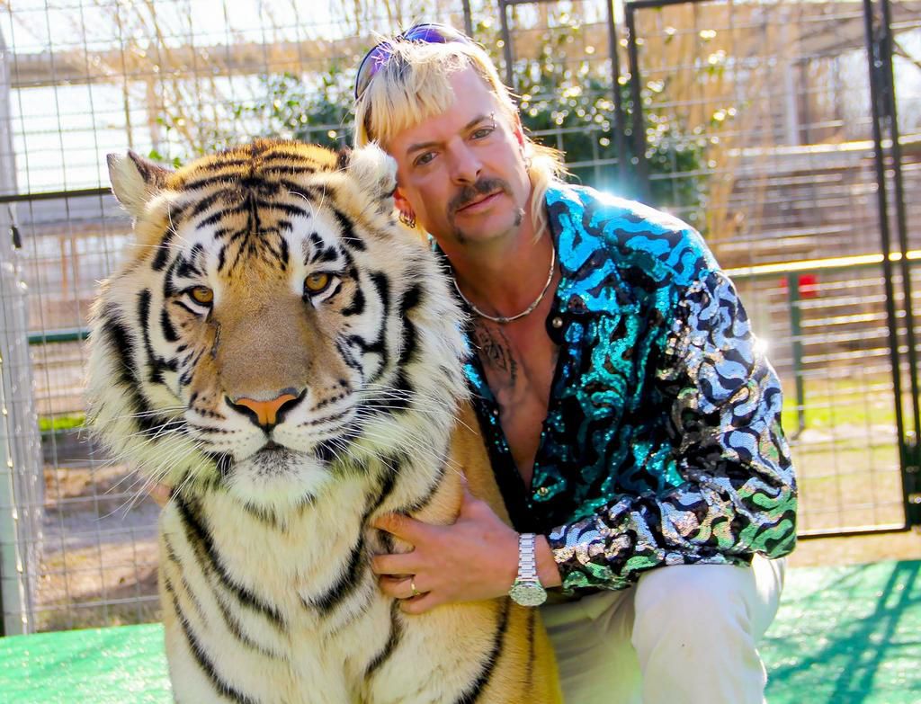 Joe Exotic and one of his tigers