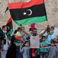 Residents of Tripoli celebrate after Libya's UN-recognised unity government announces it is back in full control of the capital and its suburbs