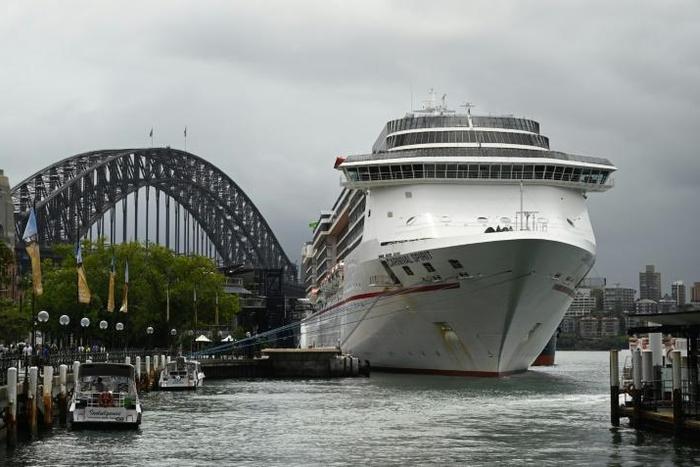 More than a dozen cruise ships are believed to be off Australia's coast, carrying around 15,000 crew and some experiencing outbreaks of coronavirus