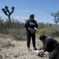 Leticia Hidalgo (L) and Angelica Orozco, members of United Forces for our Disappeared in Nuevo Leon, prepare a drone to look for human remains in Salinas Victoria Feburary 24, 2020