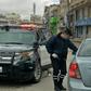 A policeman speaks to a driver at a checkpoint in the Jordanian capital Amman during a nationwide curfew imposed to control the spread of the novel coronavirus