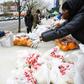 Volunteers from City Harvest food bank distribute food in Harlem, New York City