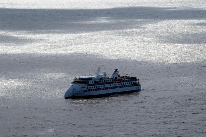 More than half of those on board the Greg Mortimer, shown here off Montevideo on April 7, have tested positive for the virus