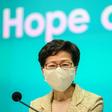 Hong Kong leader Carrie Lam sported a fabric mask Tuesday that she said would be distributed to all city residents