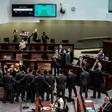 Pro-democracy lawmakers shouted slogans during the anthem debate