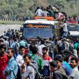 Indians clambering to get home in Guwahati, Assam state, before a government-imposed lockdown