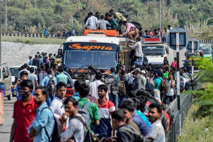 Indians clambering to get home in Guwahati, Assam state, before a government-imposed lockdown