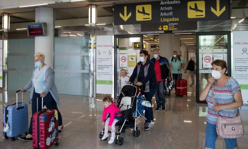 Tourists arrive in Palma de Mallorca, Spain, in June 2020 as the European Union eased coronavirus travel restrictions that remain in place for Americans who want to visit