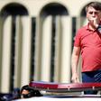 President Jair Bolsonaro coughs as he speaks to his supporters in Brasilia on April 19