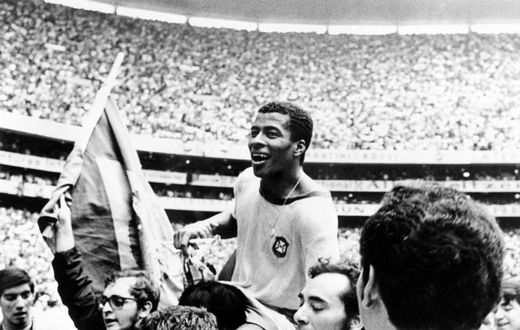 (FILES) Forward Jairzinho is carried by fans after Brazil beat Italy 4-1 in the 1970 World Cup final in Mexico City.