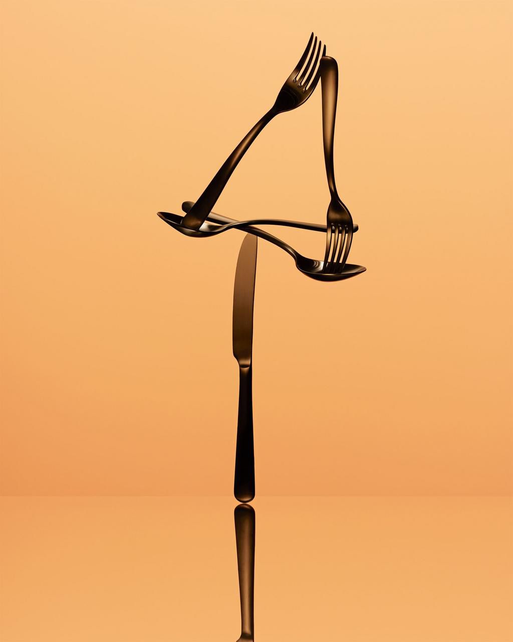 balancing spoons and forks