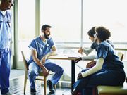 Medical team in discussion in employee lounge
