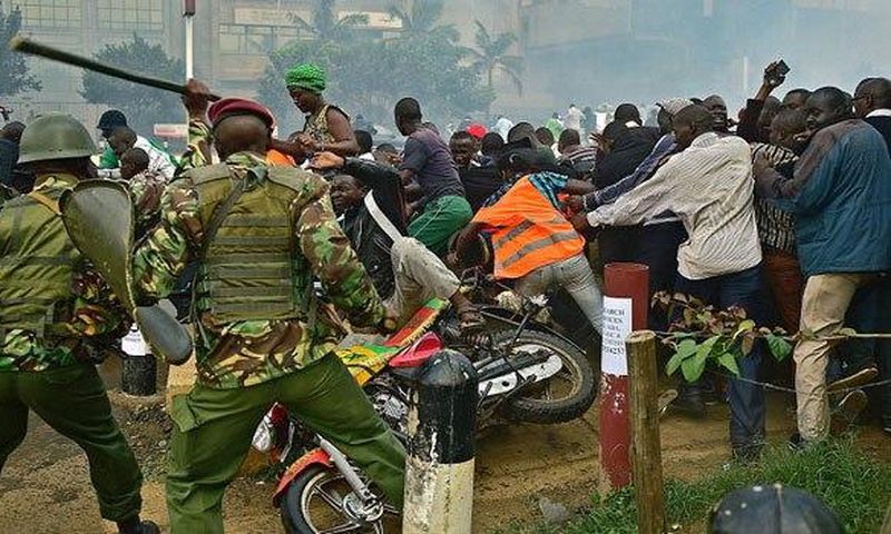 ___8808136___2018___9___4___10___POLICE-BEATING-RIOTERS
