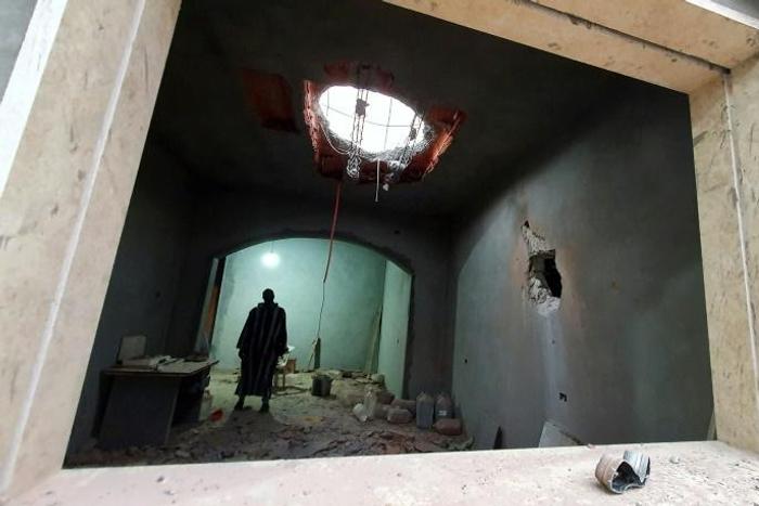 A Libyan man stands at the site of shelling on the residential area of Arada in the capital Tripoli on April 14, 2020