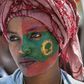 Follower: A woman's face is painted with the flag of the Oromo Liberation Front at celebrations in September 2018 to mark the return of the once-banned OLF to Addis Ababa
