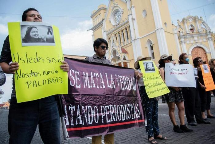 Members of the press protest against the murder of their colleague Maria Helena Ferral in the east of Mexico last month