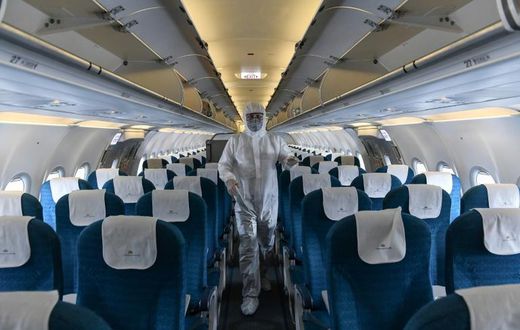 Thirteen passengers on a flight to Vietnam from Britain were found to be infected with the coronavirus