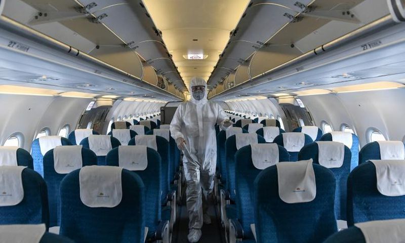 Thirteen passengers on a flight to Vietnam from Britain were found to be infected with the coronavirus