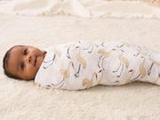 Swaddling a baby (Business Insider)