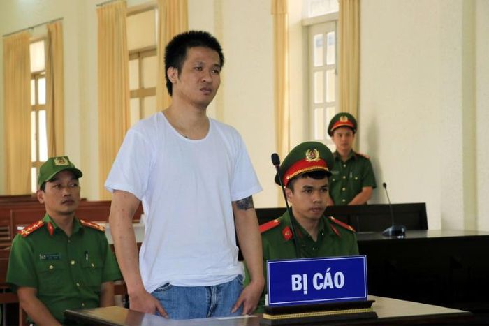 Nguyen Quoc Duc Vuong appears during a trial in Vietnam's Lam Dong province on accusations of humiliating the country's leaders