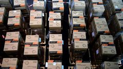 Boxes with protective masks from China -- which has exerted growing influence during the COVID-19 crisis -- are seen at a state camp in Dusseldorf, Germany, in June 2020