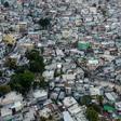 Aerial view of the high density of houses in the neighbourhood of Jalousie in Port-au-Prince, on March 12, 2020