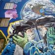 The pandemic is gaining ground in Latin America -- including in Mexico, where this mural was painted