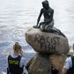 The iconic statue of the Little Mermaid in Cophengan vandalised with a phrase which has left police puzzling over what it means and who might have written it