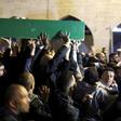 Thousands of mourners attended the funeral of Iyad Hallak